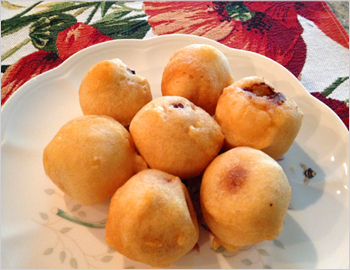 Boorelu; Boorelu is a Traditional Andhra Special Sweet prepared during Festivals. Boorelu is also called as Poornalu. This Golden Sweet ball has a yummy poornam inside which is covered by a dough, fried in oil. 