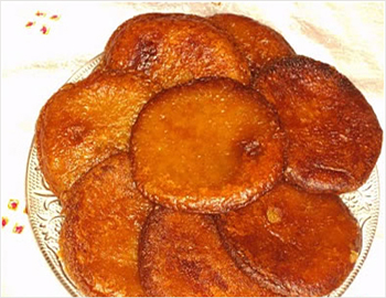 Ariselu; Made with rice flour, sweetened and stuffed with either jaggery or sugar, these sweets are circular in shape. 